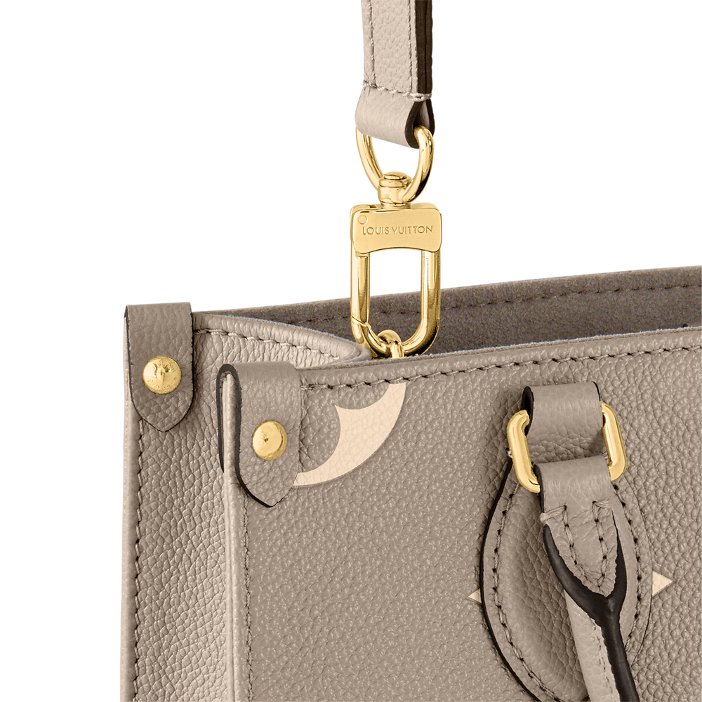 شنطة يد Louis Vuitton بنقشة Monogram Empreinte ومقبض علوي – بيج