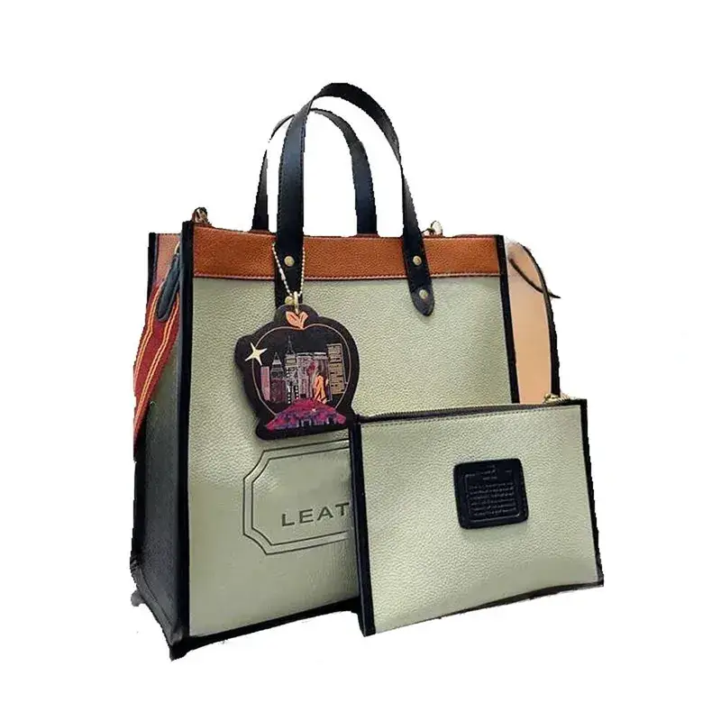 شنطة Coach Field Tote جلد مع حزام كتف ومحفظة – أخضرشنطة Coach Field Tote جلد مع حزام كتف ومحفظة – أخضر