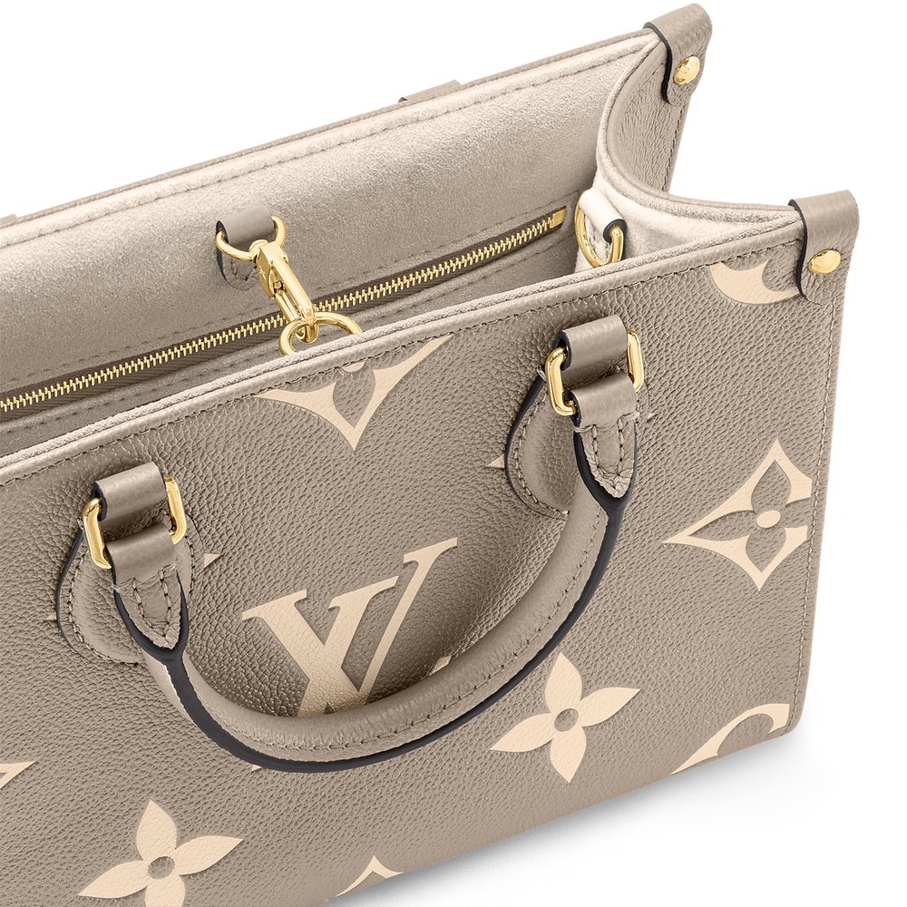 شنطة يد Louis Vuitton بنقشة Monogram Empreinte ومقبض علوي – بيج