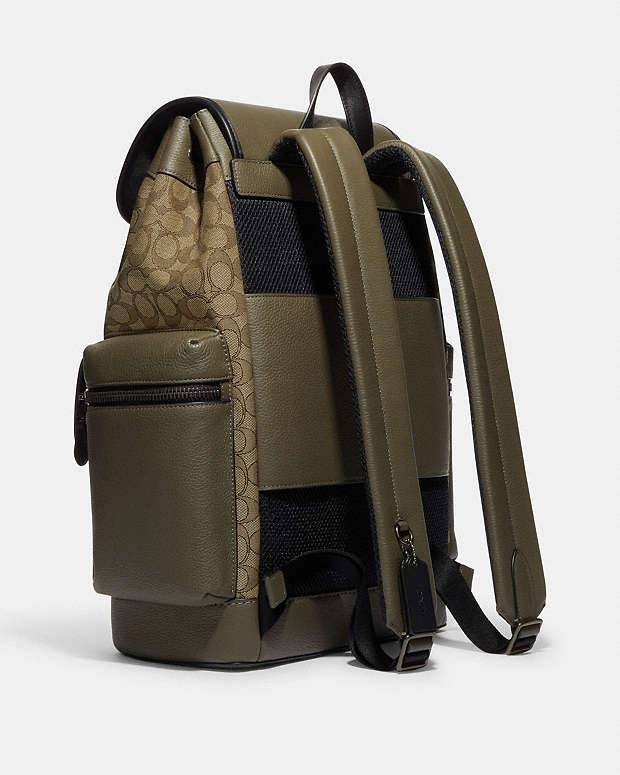 حقيبة ظهر COACH بنقشة Signature وجيوب متعددة – كاكي أخضر