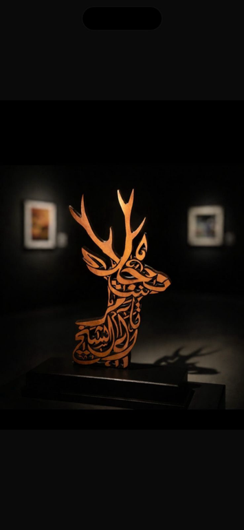 مجسم رأس غزال محفور على الخشب