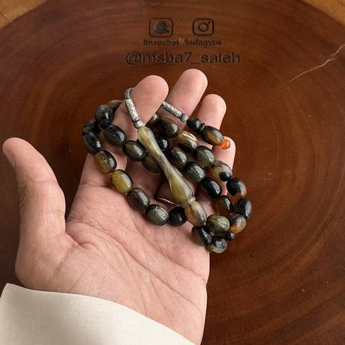قرن جاموس ( خامه طبيعيه ) بفضة طربزونية من تصميمنا