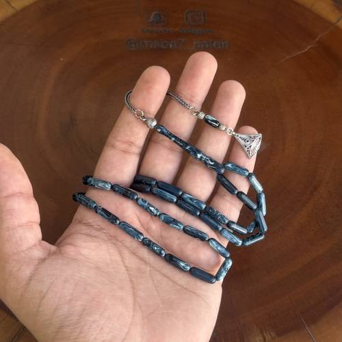بما يسمى بكلايت صنوبري ( نواعم ) بكركوش فضة عيار 925 من تصميمنا