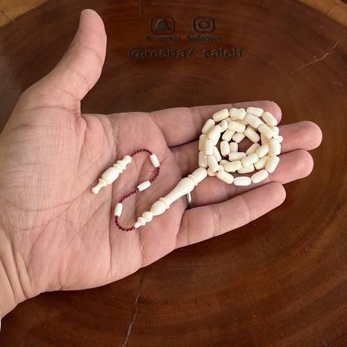 عاج تمليكة