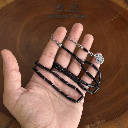 بما يسمى بكلايت صنوبري ( نواعم ) بكركوش فضة عيار 925 من تصميمنا