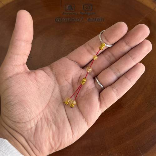 ميدالية مفاتيح ( كهرمان طبيعي ) من تصميمنا