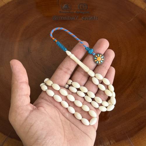 عظم جمل طبيعي بيضاوي بكركوش من تفصيلنا مضاف له مجسم البوهيمي