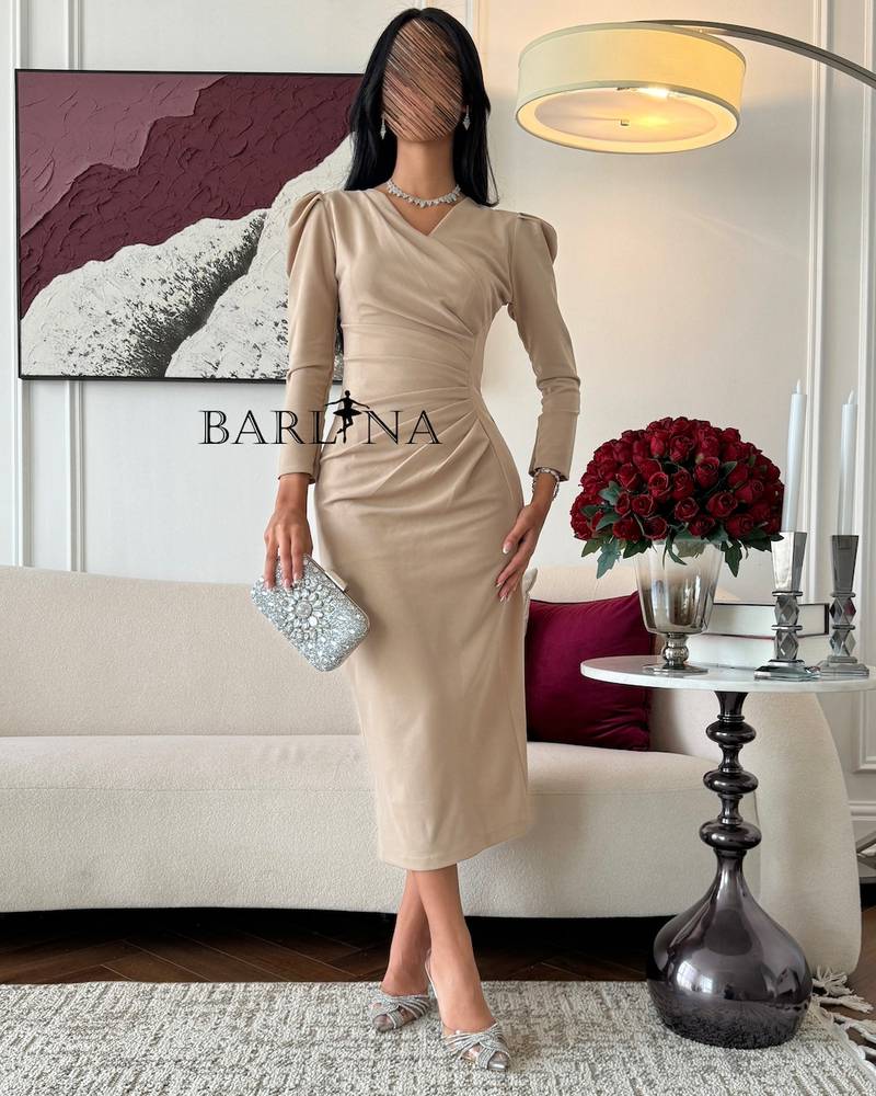 Classic elegant beige dress with long sleeves