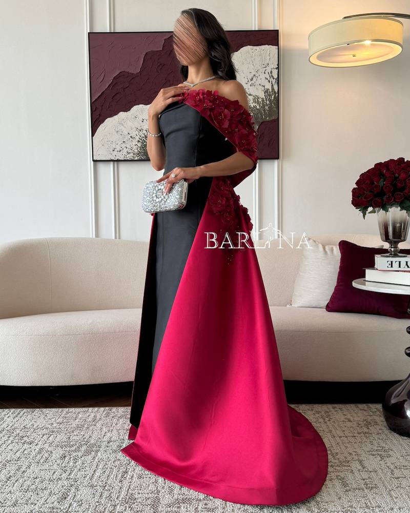 فستان سهرة أسود بذيل عنابي مورد