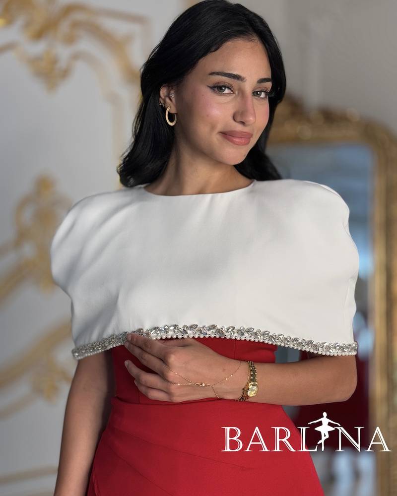 Red dress with a separate white cape