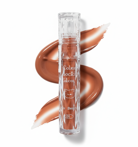 Kiss Beauty Lip Gloss No. 5 is a must-have product for anyone seeking shiny, soft, and moisturized lips throughout the day. Its lightweight and smooth formula glides on effortlessly, leaving a silky, radiant finish that enhances the natural beauty of the lips.