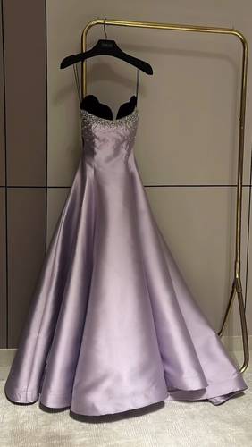 Evening dress made of taffeta and featuring crystal beads above the chest