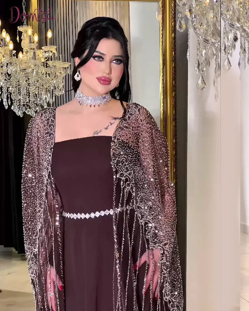 فستان سهرة بني تريندي تول مع كاب شفاف مطرز فاخر 