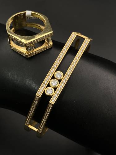 سوارة مع خاتم ذهب عالمي عيار18