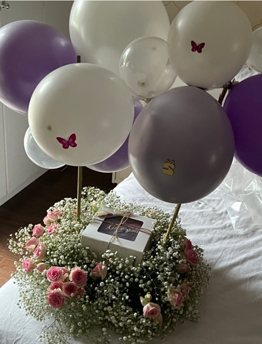 Balloons & cake with flowers