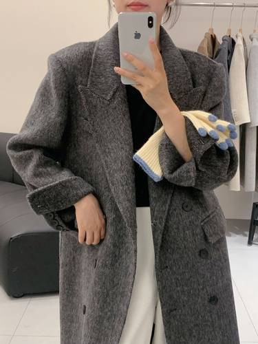 Women's long wool coat above the knee