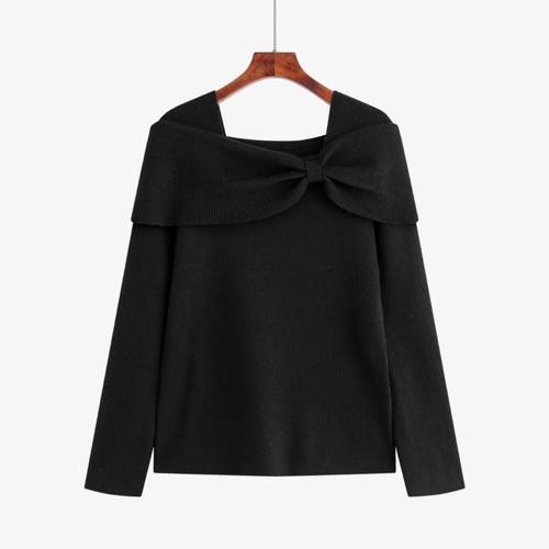 A wool sweater with a bow collar