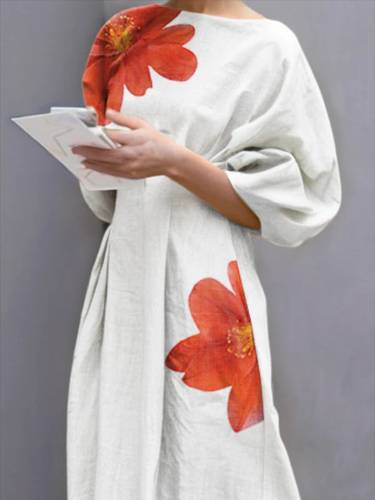 A dress with wide sleeves and a fitted waist