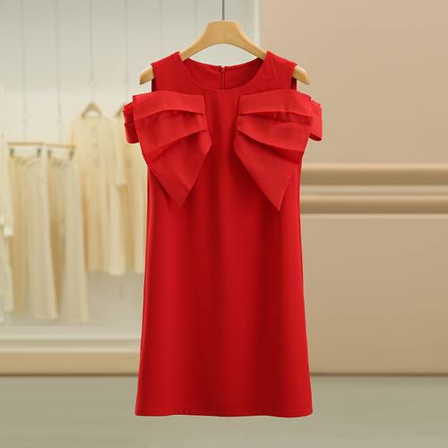 Dress decorated with a 3D bow