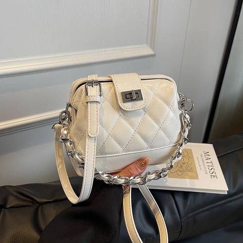 Chanel-style quilted chain shell bag