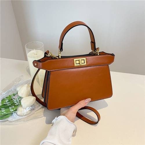 Solid Color Kelly Rotary Buckle Handbag