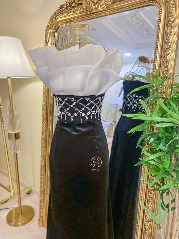  فستان اسود مع شك فصوص 