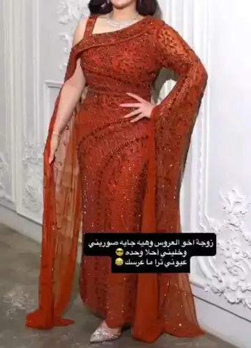 فستان طوبي تل تيواني مع تطريز كمبيوتر فصوص 