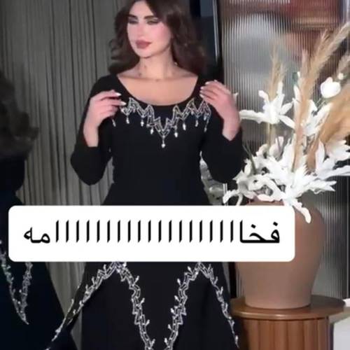 فستان كريب اسود مع تطريز يدوي 