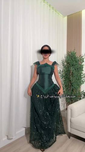 فستان زيتي ميكادو مع كلفه شك سهره 