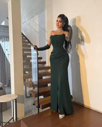 فستان زيتي باربي مع تطريز يدوي راقي 
