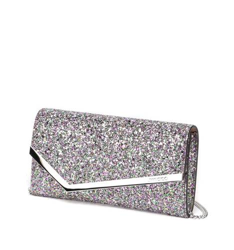 Leather clutch covered in glitter and detailed with detachable shoulder strap and magnetic fastening.