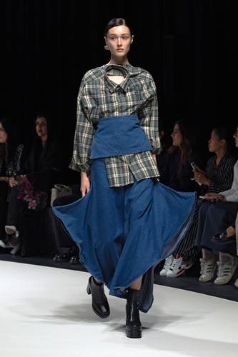Distressed Jeans With Asymmetrical Top