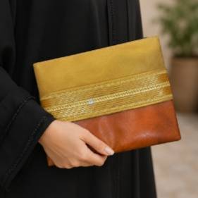 حقيبة يد فاخرة من الجلد الفاخر الذهبي  والبني مزين بالزري الذهبي  المشغول يدوياً 