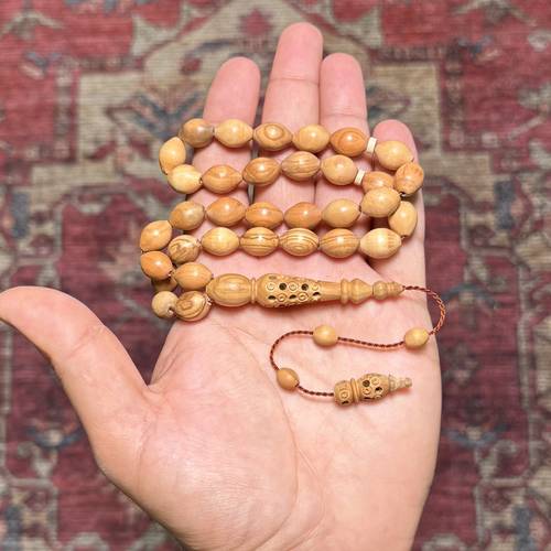 سبحة خشب الزيتون الطبيعي عدد الخرز 33 مقاس الخرز 10*13ملي 