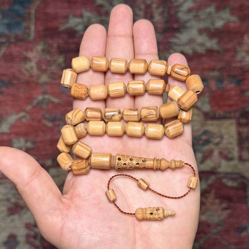 سبحة خشب الزيتون الطبيعي عدد الخرز 33 مقاس الخرز 10*12ملي