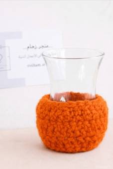 ماسك بياله كروشيه لون برتقالي تحمي من الحرارة