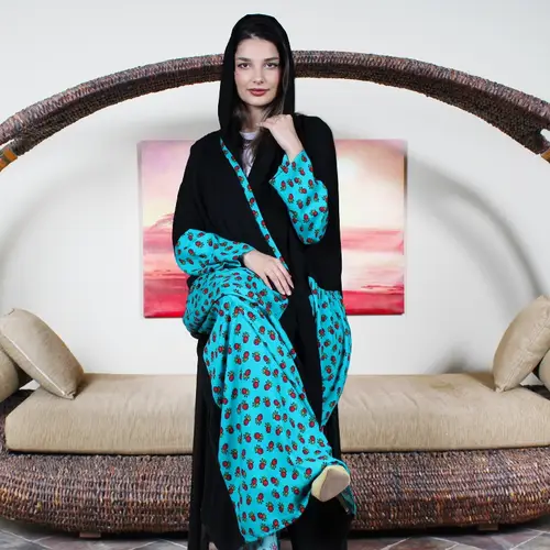 Silky blue abaya with rose inserts, elegant ball design
