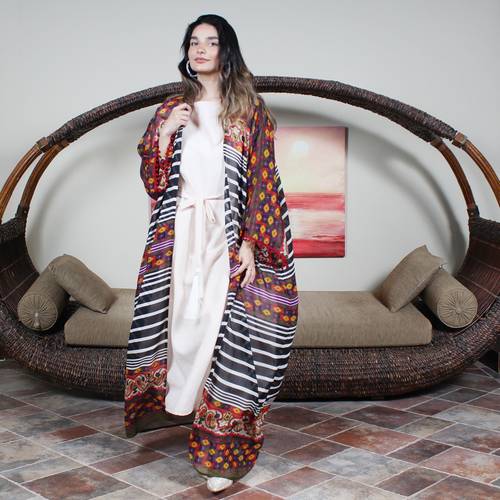 A practical colorful abaya with red cotton edges
