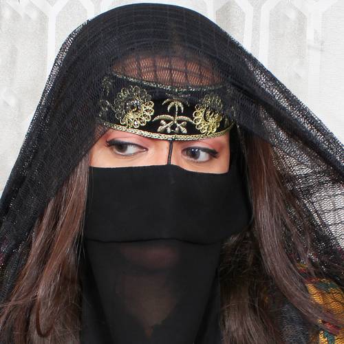An elegant burqa embroidered with the Saudi Arabia emblem
