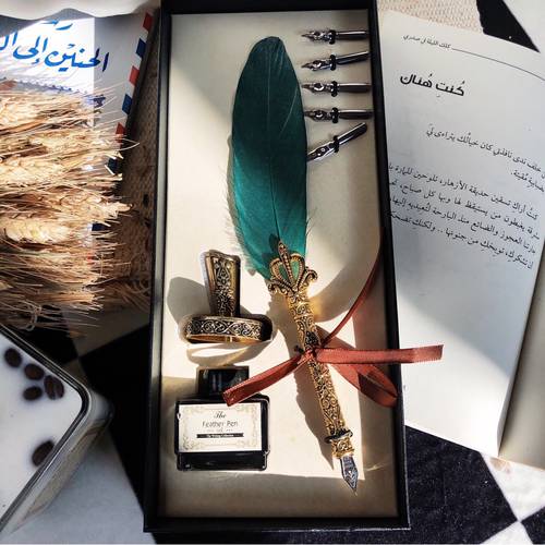 قلم الريشة الذهبي