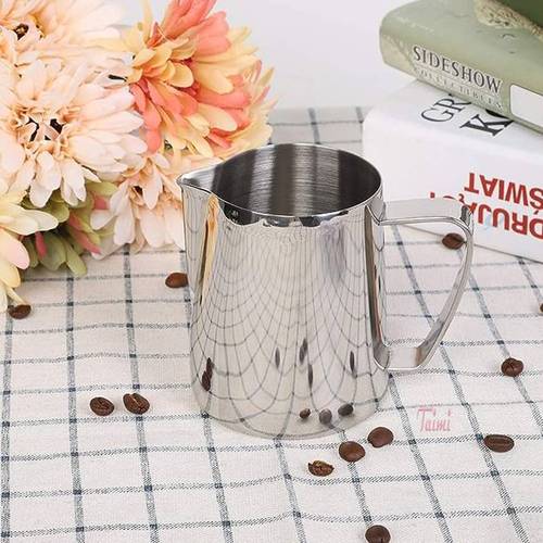 A milk frothing jug made of stainless steel with a capacity of 200ml