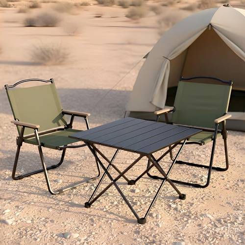 Multi-piece camping set, black table with pointed legs in several sizes, with green chairs with a black metal frame.
