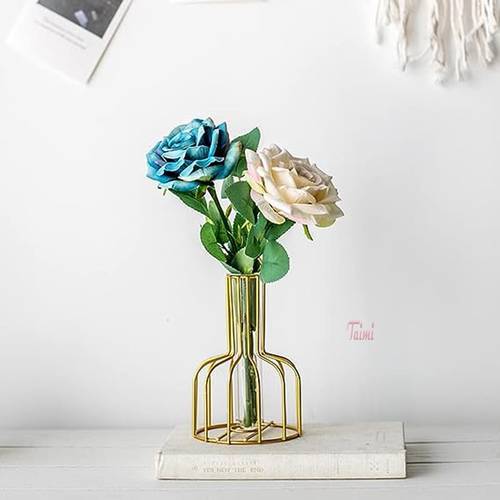 Clear glass vase with golden metal stand