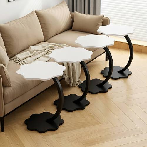 A set of 2 & 4 multi-colored C-shaped tables, a table with a petal-shaped wooden top and metal frame, a bedside table and sofa table 40X60cm.