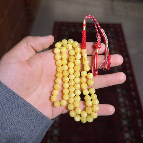 مسباح شبيه لـتراب كهرمان بكركوشة حرير فاخر
