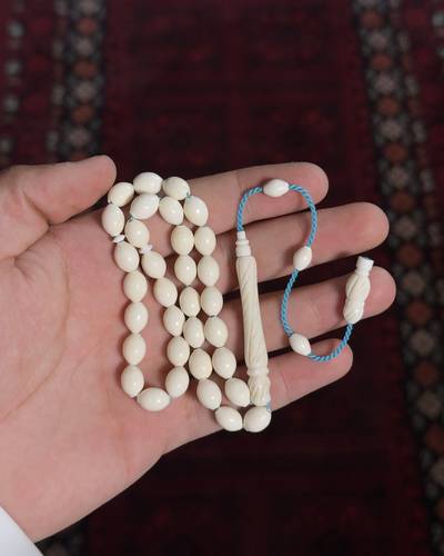 مسباح عظم الجمل شاهد منقوش