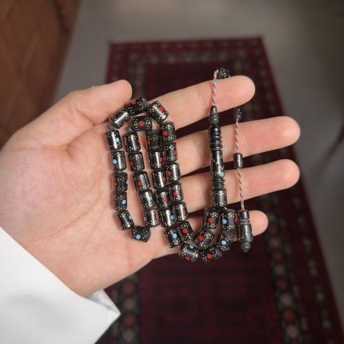مسباح خشب أبنوس مطعم مرجان و فيروز