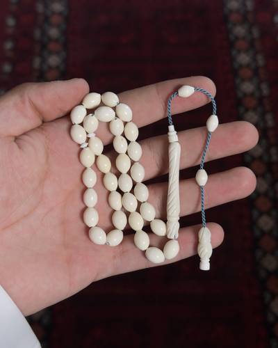 مسباح عظم الجمل شاهد منقوش