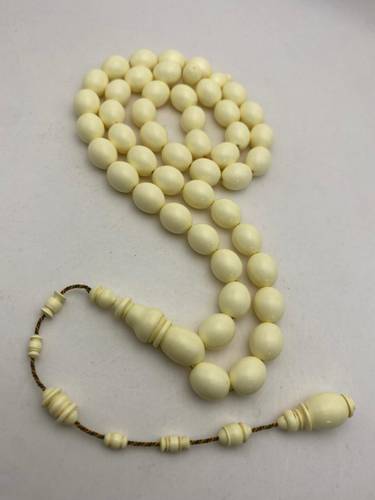 Luxury Vintage Domino Bakelite Misbaha Pigeon Egg Shape 47 Beads 30g – Crafted by Al Zaeem