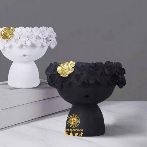 A beautiful resin flower pot or vase for the desk or table